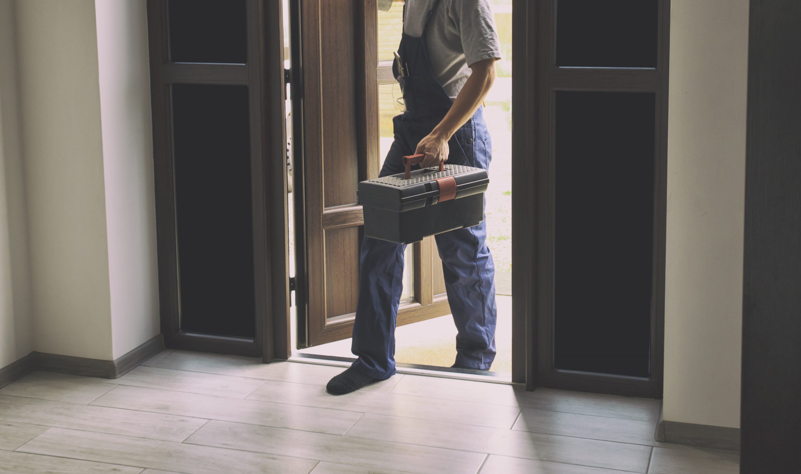 A person discussing repairs and maintenance in their home